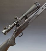 Remington Model 700 LH .223 REM bolt-action rifle with textured semi-pistol grip, sling mounts, bi-