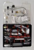 A collection of air rifle and compressed air bottle fittings and filling accessories including quick