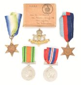 Four WW2 medals comprising 1939-45 Star, Atlantic Star, War and Defence Medals, postal box with