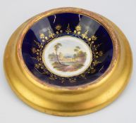 Crown Derby dish with landscape decoration, in gilt surround, diameter 20cm