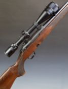 Tikka M590 LH .308 WIN bolt-action rifle with chequered semi-pistol grip and forend, sling mounts,