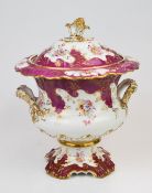 Large 19thC twin handled covered pedestal porcelain campagna urn decorated with flowers, probably