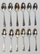 Twelve hallmarked silver teaspoons, the tops decorated with a pair of revolver pistols, possibly for