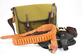 A collection of shooting related accessories comprising Armex Buckingham Collection game bag,