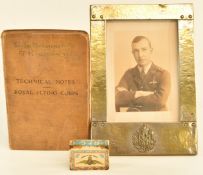 WW1 Royal Flying Corps matchbox cover, framed photograph of an RFC officer with cap badge attached