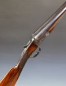 BSA 12 bore side by side ejector shotgun with engraved scenes of birds to the lock scrolling