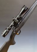 Browning T-Bolt .17 HMR bolt-action rifle with textured semi-pistol grip, sling mounts, gilt