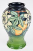 Moorcroft pedestal vase decorated in the Passion Flower pattern, height 16.5cm