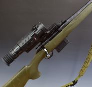 Howa Model 1500 .22-250 bolt action rifle with composite stock, textured semi-pistol grip and
