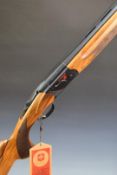 ATA Supersport 12 bore over and under ejector shotgun with chequered semi-pistol grip and forend,