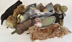 Ten various bird and rabbit decoys including floating ducks, crow, magpie, vibrating rabbit etc.