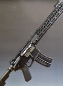 Hammerli TAC R1 .22 assault style rifle with textured pistol grip, tactical stock, pop-up sights,