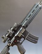 Heckler & Koch .22 semi-automatic assault style rifle with textured pistol grip, tactical stock,