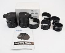 Two Pulsar FN 50 Cover Rig Adaptors, one in original box with instructions and accessories.
