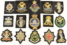 Thirteen bullion wire and cloth blazer badges including 9th/12th Lancers, Worcestershire Regiment,