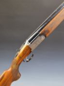 Lincoln No 2 12 bore over and under ejector shotgun with engraved scenes of dogs and birds to the