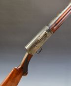 Browning 12 bore 3-shot semi-automatic shotgun with named and engraved locks, semi-pistol grip and