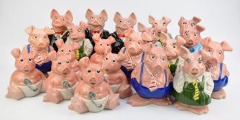Large collection of Wade Nat West pig money boxes