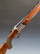 Nikko 612 12 bore over and under ejector shotgun with engraved locks, underside, trigger guard and