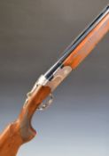 Beretta 686 Onyx 12 bore over and under ejector shotgun with named lock and underside, chequered