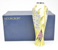 Moorcroft signed vase decorated in the Florian Hyacinth pattern, dated 2012, height 27cm