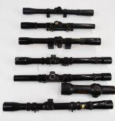 Seven various rifle scopes comprising Single Point, Nikko Stirling Mountie 4x20, Bokson 4x20 and