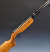 Relum Tornado .22 under-lever air rifle with chequered semi-pistol grip, raised cheek piece and