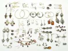 Twenty seven pairs of silver earrings including pressed amber, labradorite, amethyst, mother of