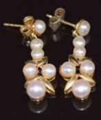 A pair of 9ct gold earrings set with cultured pearls, 3.8g