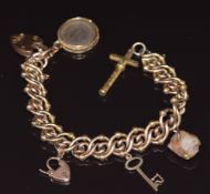A 9ct rose gold bracelet with two 9ct gold heart padlocks, 9ct gold '21' key charm, propelling