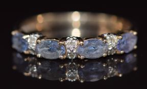 A 9ct gold ring set with tanzanites and diamonds, 1.6g, size P