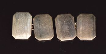 A pair of 9ct gold cufflinks with engine turned decoration, Birmingham 1944, 5.3g