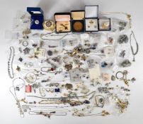 A collection of costume jewellery including diamanté, silver earrings, 9ct gold earrings (1g), etc