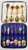 Ten various souvenir spoons to include two hallmarked silver and a French silver example, enamel