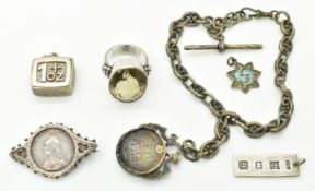 A collection of silver including 1oz ingot, another ingot, brooch set with a 1887 silver crown, ring