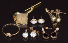 A 9ct gold ring set with a sapphire (0.8g), 14k gold pin (1g) and four pairs of 9ct gold earrings
