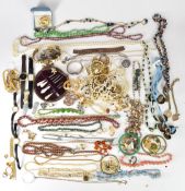 A collection of costume jewellery including beads, watches, Timex watch, chains and pendants,