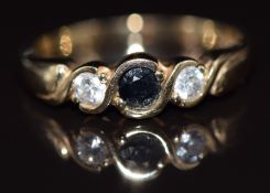 A 9ct gold ring set with a sapphire and cubic zirconia, 2.3g, size N