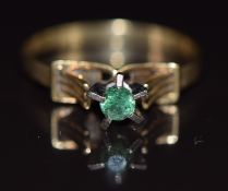 A 14k gold ring set with an emerald, size P, 2.5g