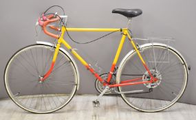 Vintage gentleman's touring bicycle with drop handlebars and Shimano Altus derailleurs and