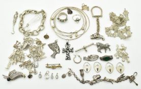 Silver charm necklace with fifteen silver charms, a silver key ring, silver charm bracelets, four