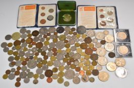 A quantity of overseas and UK coins including modern crowns with £5 examples, decimal sets, cased
