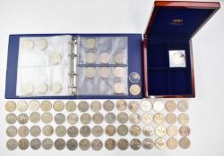 A collection of approximately seventy modern crowns contained in a wooden box and some in an album.