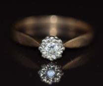 A 9ct gold ring set with a diamond in an illusion setting, 1.8g, size M