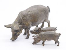 Austrian or similar cold painted bronze pig and two piglets with indistinct marks but in the style