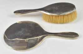 Hallmarked silver hand mirror and brush, Chester 1928, maker Charles Perry & Co