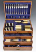 Oak cased 12 place setting canteen of silver plated cutlery, including fish eaters, ladles,