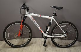 Claud Butler Alpina Mountain bicycle with 26 inch wheels, SR Suntour XCM forks and disc brakes