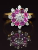 An 18ct gold ring set with diamonds and rubies in a cluster, 5.7g, size Q
