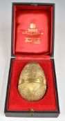 Stuart Devlin retro limited edition (142/300) silver gilt novelty egg with textured exterior,